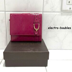 GUCCI Style 309755 - Micro Guccissima Patent Leather Bi-Fold Magenta Wallet
